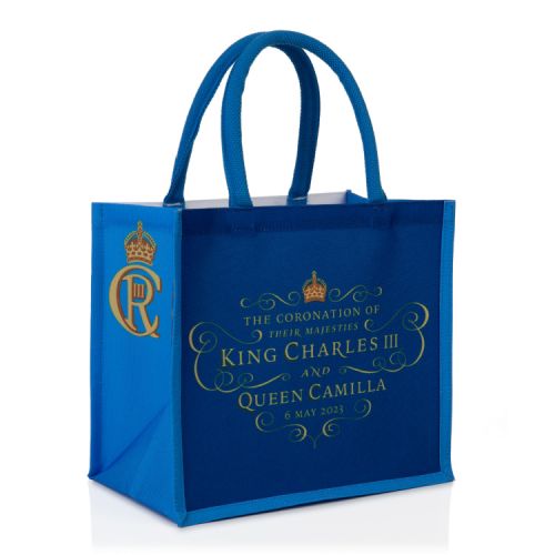 White bag with blue handles and sides. Coat of arms at the centre. 