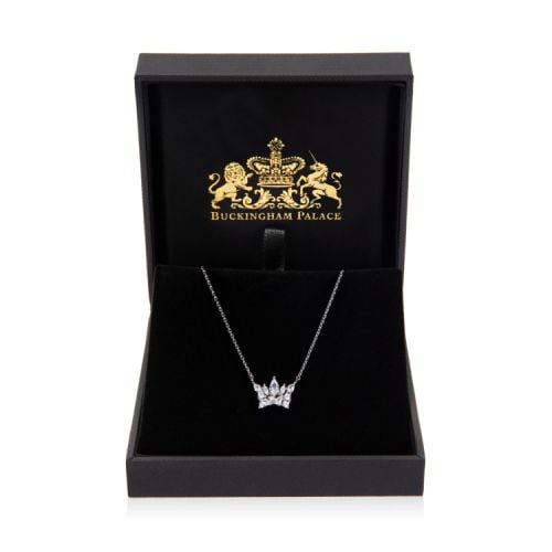 Silver chain with silver crown pendant decorated with crystals. 