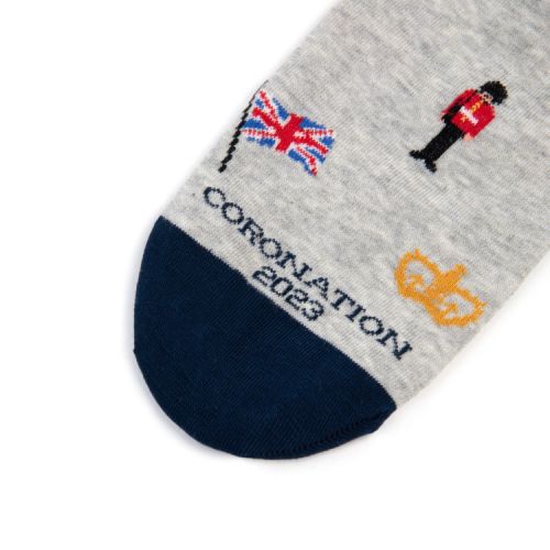 Grey socks with navy toes and heels. Illustrations or crowns, Union Jacks and Palace Guardsmen. 