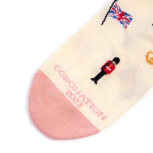 Cream socks with pink toes and heels. Illustrations or crowns, Union Jacks and Palace Guardsmen. 