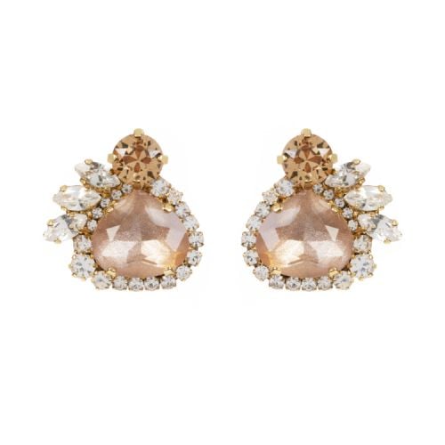 A pair of pale pink crystal earrings. Surrounded by an assortment of brown and clear crystals.