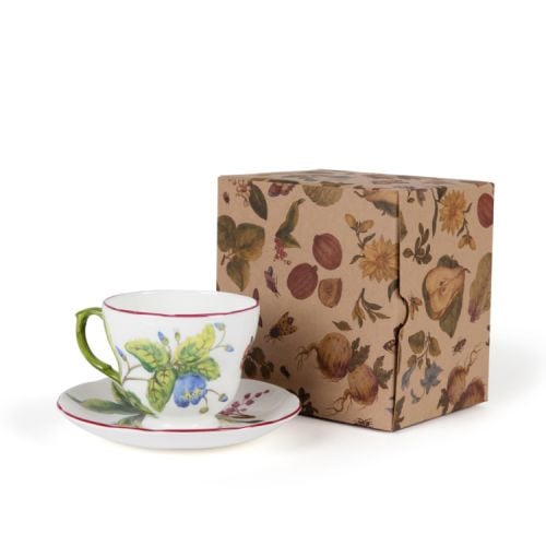 Chelsea fine bone china teacup and saucer with a design featuring  botanical paterns on both pieces and in the inner side of the cup. Displayed with presentation gift box.