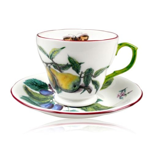 Chelsea porcelain teacup and saucer with box. White saucer with green handle. Both cup and saucer have red hand-painted rim. Decorated with berries, leaves and insects