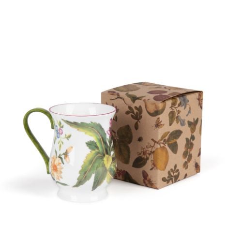 Chelsea mug with box. White with green handle and red, hand-painted rim. Decorated with leaves and flowers