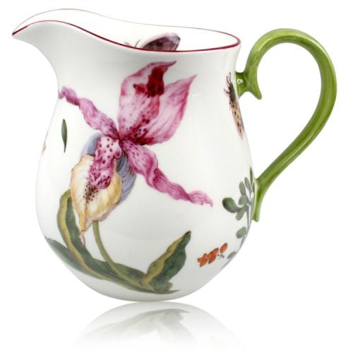 Chelsea porcelain milk jug with green handle and red hand painted rim. Decorated with leaves, insects, flowers and berries.