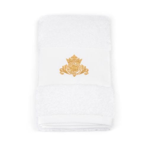 White hand towel with Windsor Castle crest. Wrapped with a gold and white label. 