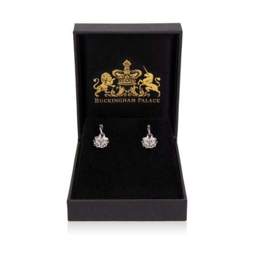 two silver drop earrings in a rose shape 