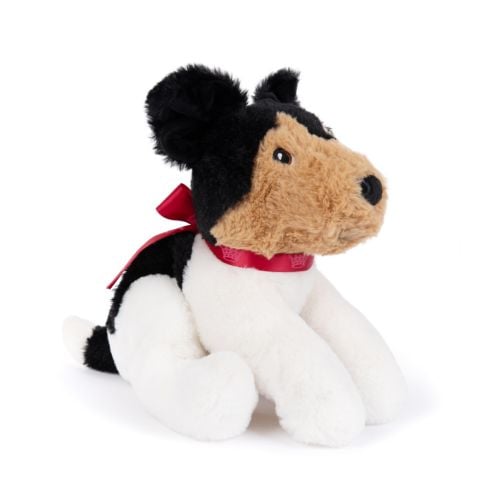 dog soft toy with brown soft face and black ears. Red satin bow with details of crowns
