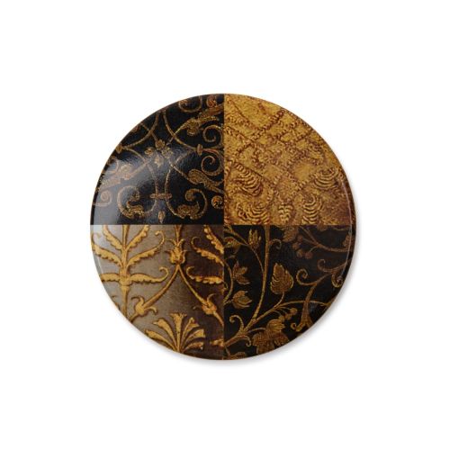 round magnet with decoration in black and gold 