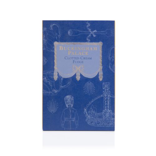 Front of Buckingham Palace clotted cream fudge box. Blue box with white illustrations of variety of objects including guardsmen, crowns and chinaware. 