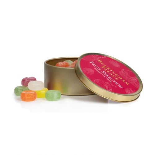 Open gold tin of fruit sweets