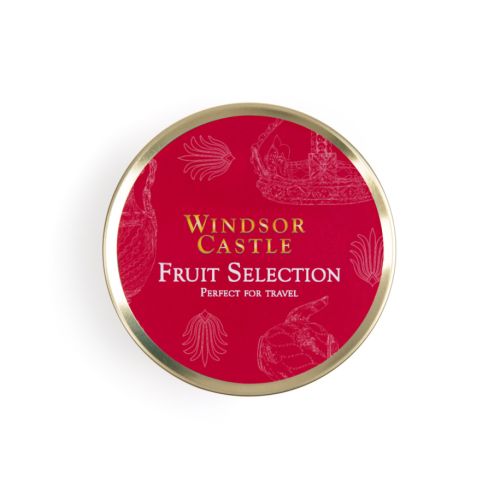 Top of tin of fruit selection. Red background on gold round tin with white illustrations featuring a variety of illustrations including teacup, fork and crown. 