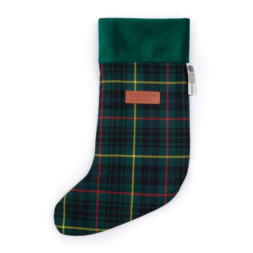 Green tartan stocking with brown leather label with BUCKINGHAM PALACE ebossed on the front.