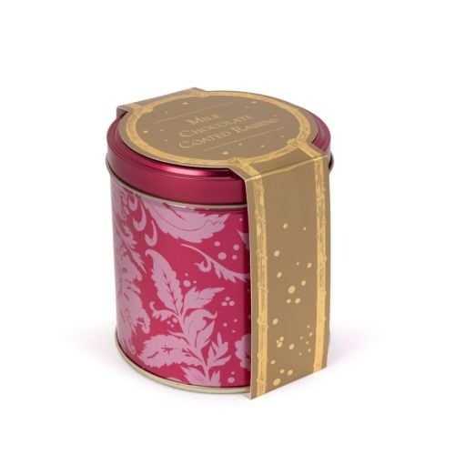 Pink tin with acanthus print pattern. Wrapped in gold cardboard. 