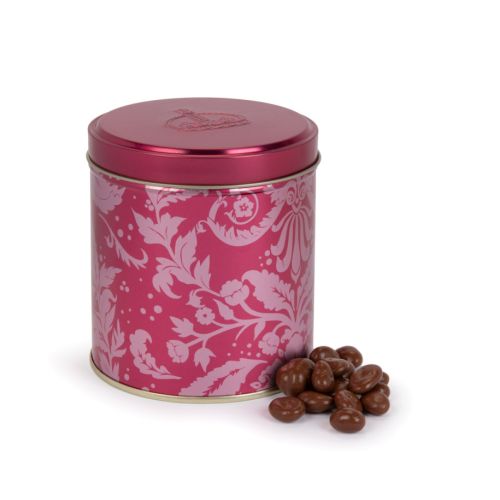 Pink tin with acanthus print pattern. Wrapped in gold cardboard. 