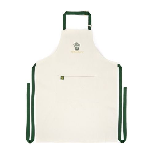 Cream cotton Windsor Castle Apron with green staps and Windsor Castle emblem at centre. 