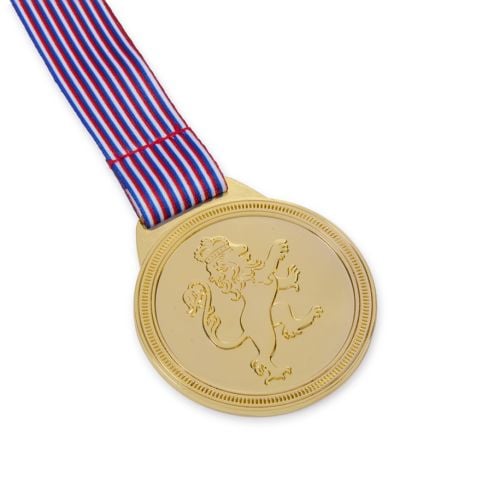 Gold coloured reversable medal in packaging featuring a unicorn and a lion on each side. 
