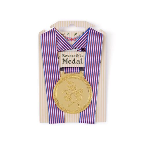 Gold coloured reversable medal in packaging featuring a unicorn and a lion on each side. 