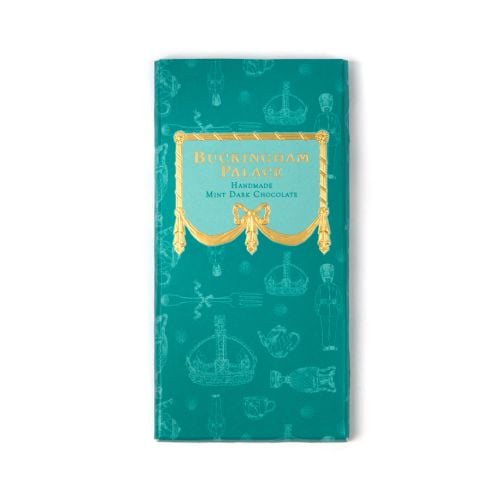 Bar of Buckingham Palace mint chocolate in teal packaging sleeve with gold detail. Illustrated with items from the Royal Collection.