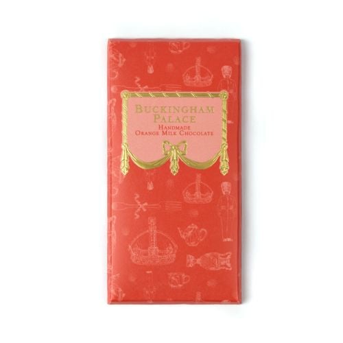 Bar of Buckingham Palace orange chocolate in orange packaging with gold detail. Illustrated with items from the Royal Collection.