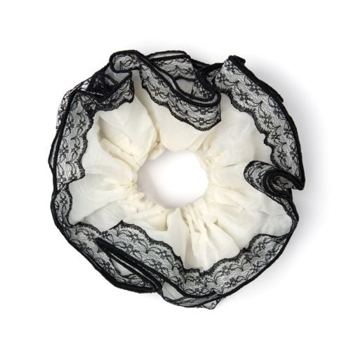 Ivory with black lace detail scrunchie on model. 