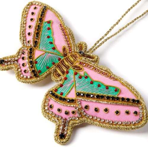 Beeded butterfly decoraiton with gold string. 