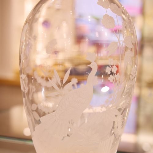 East Wing vase with exotic birds and foliage etched on.