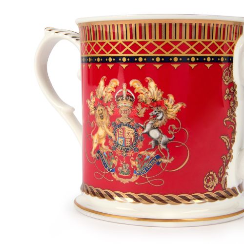 RM200 scarlet red Loving Cup with the cypher of His Majesty King Charles III  with gold band detail and two handles. 