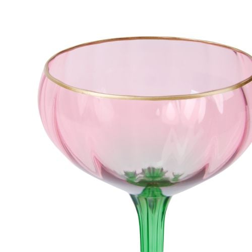 Single chandelier inspired coupe with green stem and base and pink coupe with gold rim. 