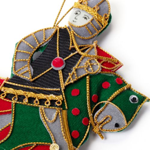 Knight on Horseback Christmas Decoration with red and green colours and gold thread. 