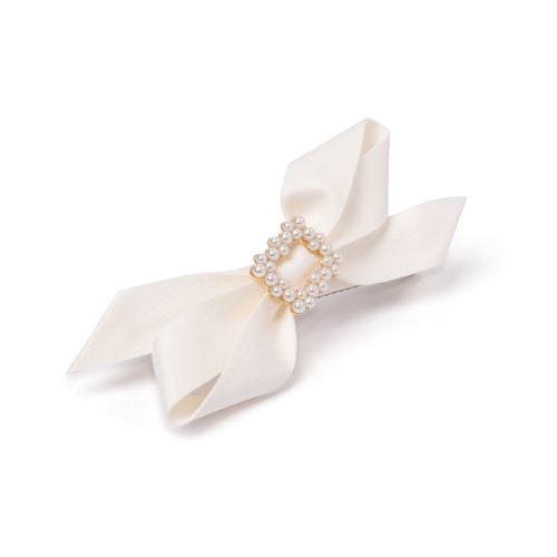 Silk cream bow barette with pearl style clasp.