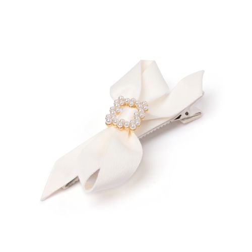Silk cream bow barette with pearl style clasp.