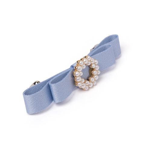 Blue silk barette with pearl studded detail. 