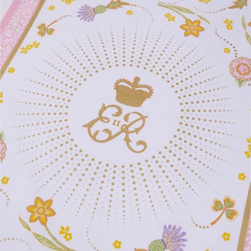 Pink and white floral Tea towel featuring Queen Elizabeth cypher encircled by a golden starburst.