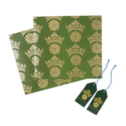 Deep green wrapping paper with gold Tudor Rose with crown logo of Windsor Castle. 