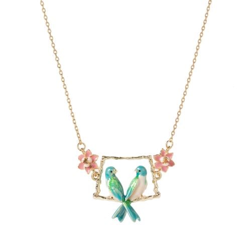 East wing lovebirds pendant necklace, pink enamel roses with blur b
green and white birds on perch.