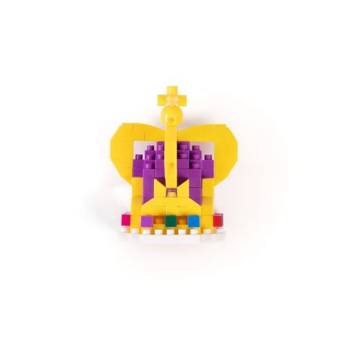 Blue box containing a royal crown mini building blocks magnet set, showing a yellow and purple block-style crown on the front.