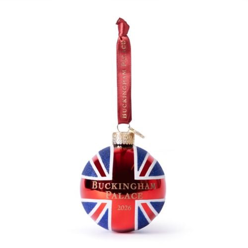 Red, white and blue Union Flag glass bauble with Buckingham Palace 2026 gold detailing, red satin ribbon and crown charm.