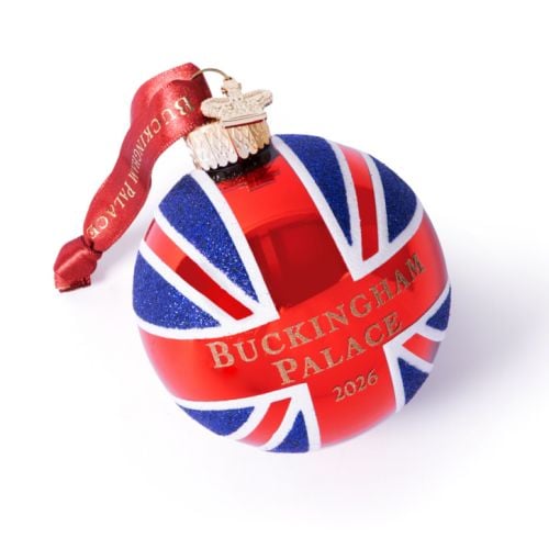 Red, white and blue Union Flag glass bauble with Buckingham Palace 2026 gold detailing, red satin ribbon and crown charm.