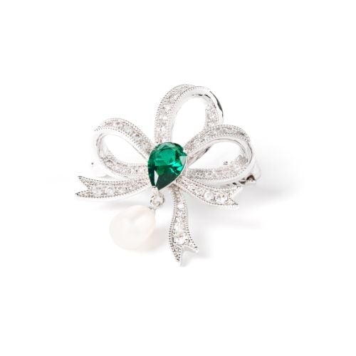 Bow crystal stud brooch with larger teardop green gem and pearl drop, set in silver.