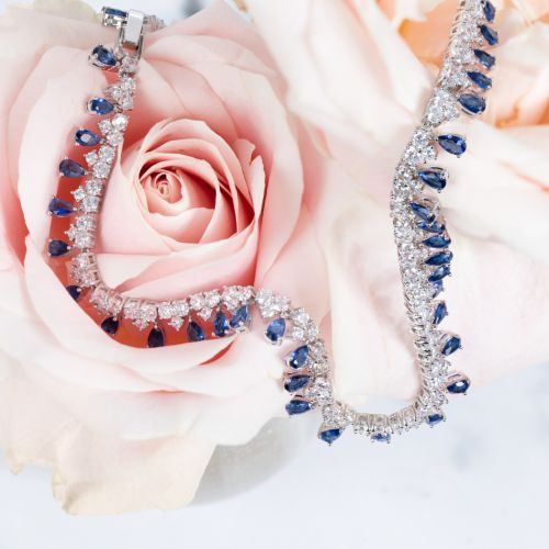 Blue crystal teardrop fringe necklace, with silver clasp and crystal studs. 