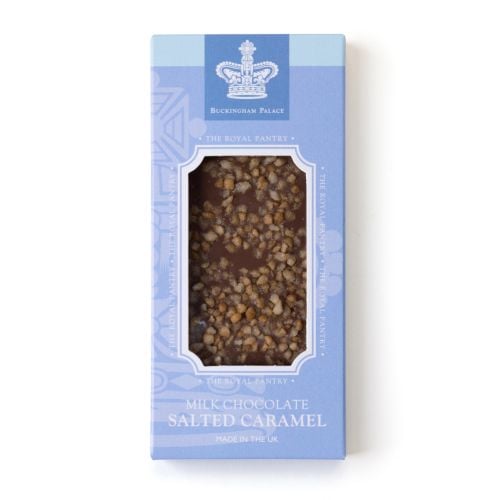 Front view of a Buckingham Palace Milk Chocolate Salted Caramel bar in a light blue presentation box, featuring a clear window that reveals the milk chocolate bar topped with crunchy salted caramel pieces.