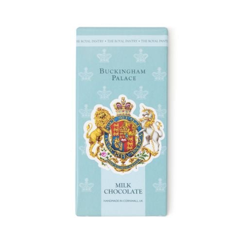 Palace milk chocolate bar packaging, featuring the royal coat of arms on a pale blue background with crown motif