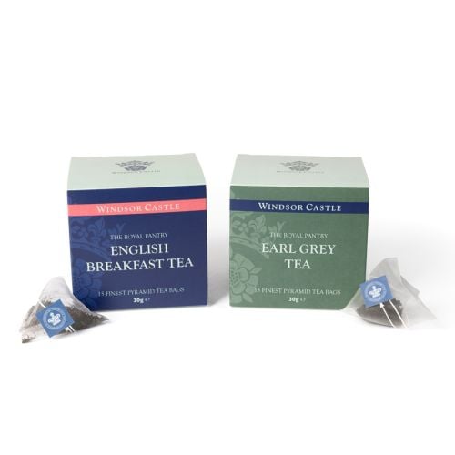 Royal Collection Trust Finest Leaf Tea Gift Duo featuring English Breakfast and Earl Grey tea in a presentation box with viewing window and two pyramid tea bags displayed alongside.