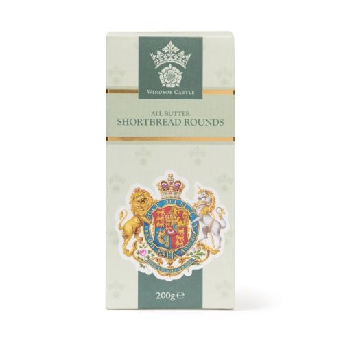 Box of Windsor Castle all butter shortbread rounds with two biscuits placed in front, featuring a royal coat of arms design, 200g.
