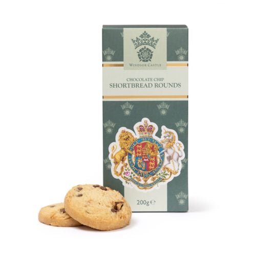 Box of Windsor Castle chocolate chip shortbread rounds with two biscuits placed in front, featuring a royal coat of arms design, 200g.