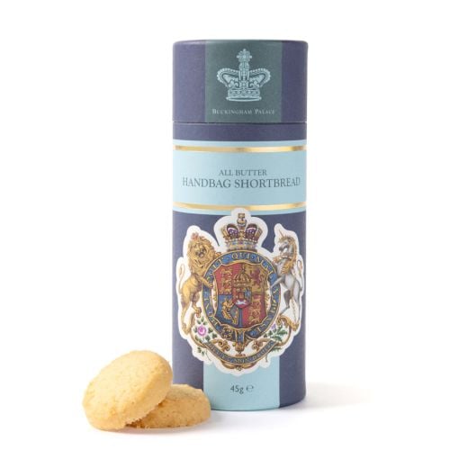 Buckingham Palace All Butter Handbag Shortbread 45g in a decorative blue and pale blue gift tube featuring a royal coat of arms, displayed with two round shortbread biscuits.