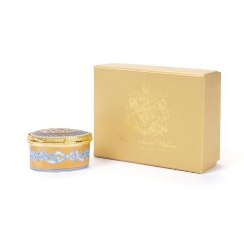 Queen Elizabeth II 90th Birthday Limited Edition Oval Box in blue and gold next to gold Buckingham Palace presentation box.