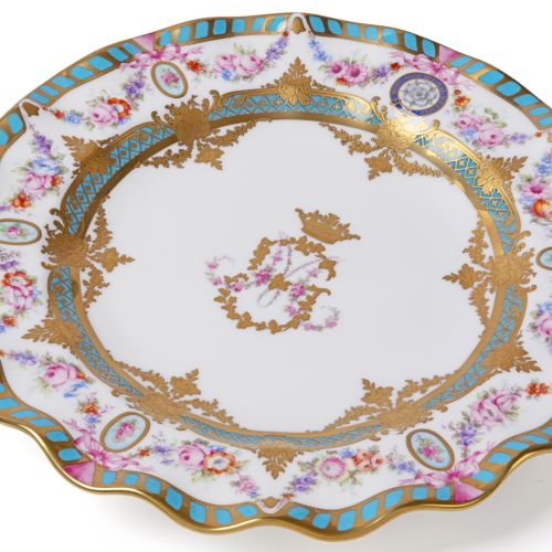 Buckingham Palace limited edition dessert plate with turquoise, pink and gold floral decoration and crowned central monogram.
