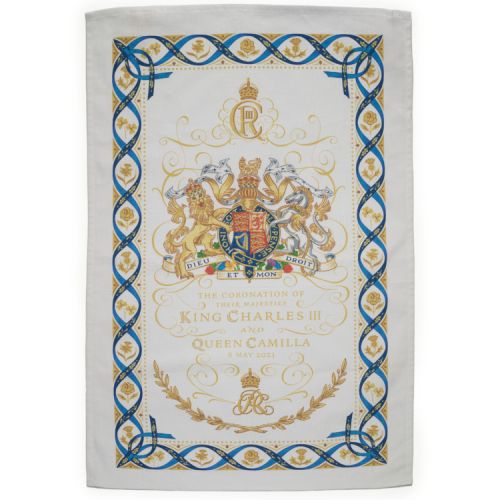 White tea towel with decorations.